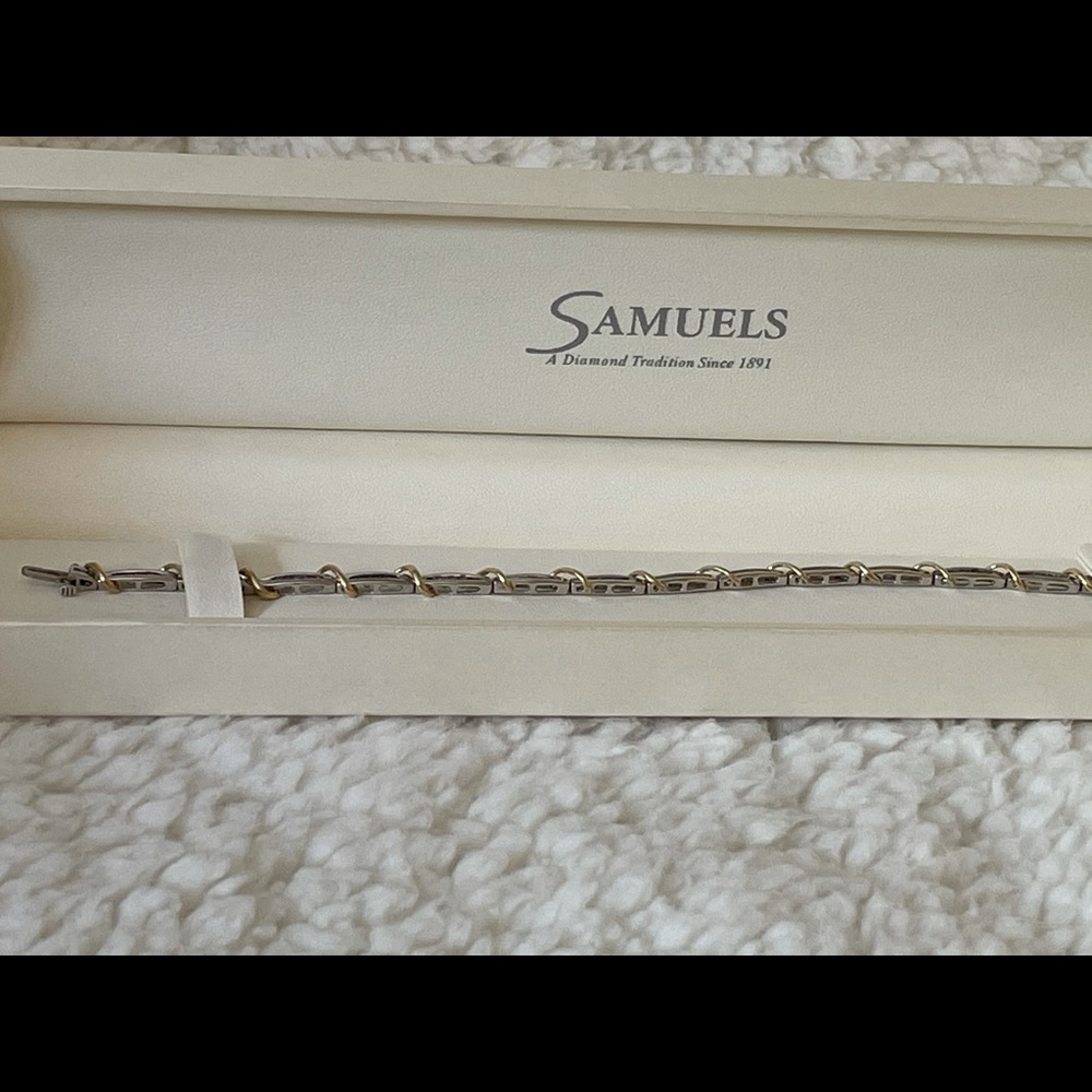 White Gold Diamond tennis bracelet w/ Gold accents